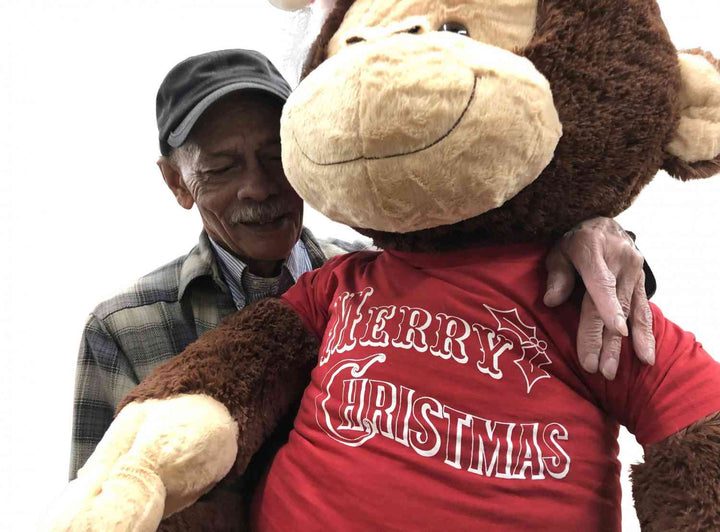 Merry Christmas Giant Stuffed Monkey 4 Feet Tall Soft Brown Large Plush Ape wears Holiday T-Shirt 48 Inches New - Big Plush® 