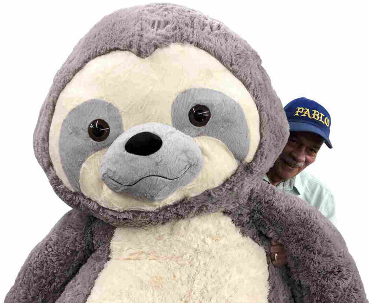 This awesome 7 feet tall plush Sloth has the most adorable and cute face.