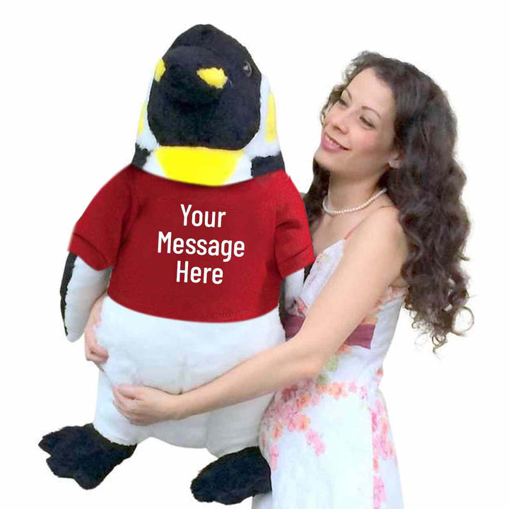 Your custom text is printed on the black tshirt that this Big Plush penguin is wearing. The shirt can be removed without damaging the stuffed animal.