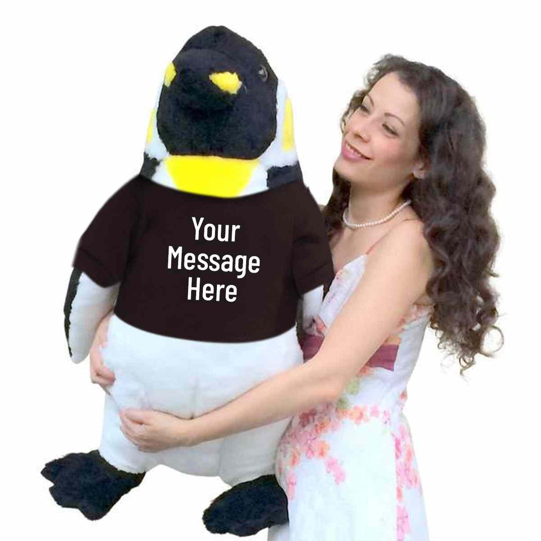 Your custom text is printed on the black tshirt that this Big Plush penguin is wearing. The shirt can be removed without damaging the stuffed animal.