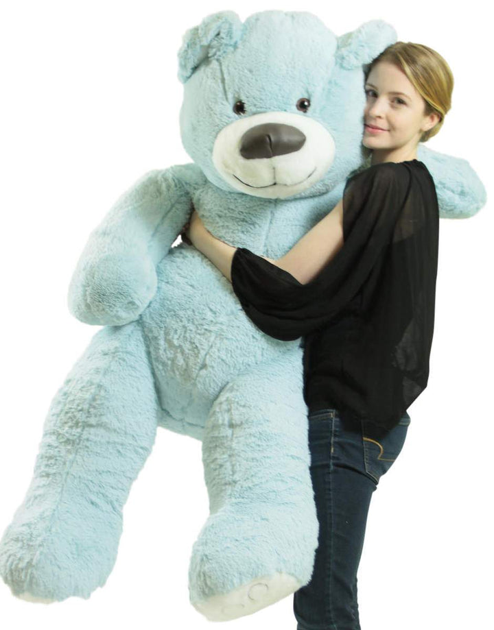 Giant blue teddy bear measures five feet tall.