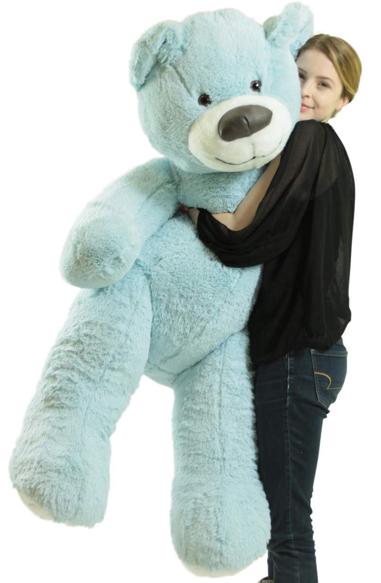 Giant blue teddy bear measures five feet tall.